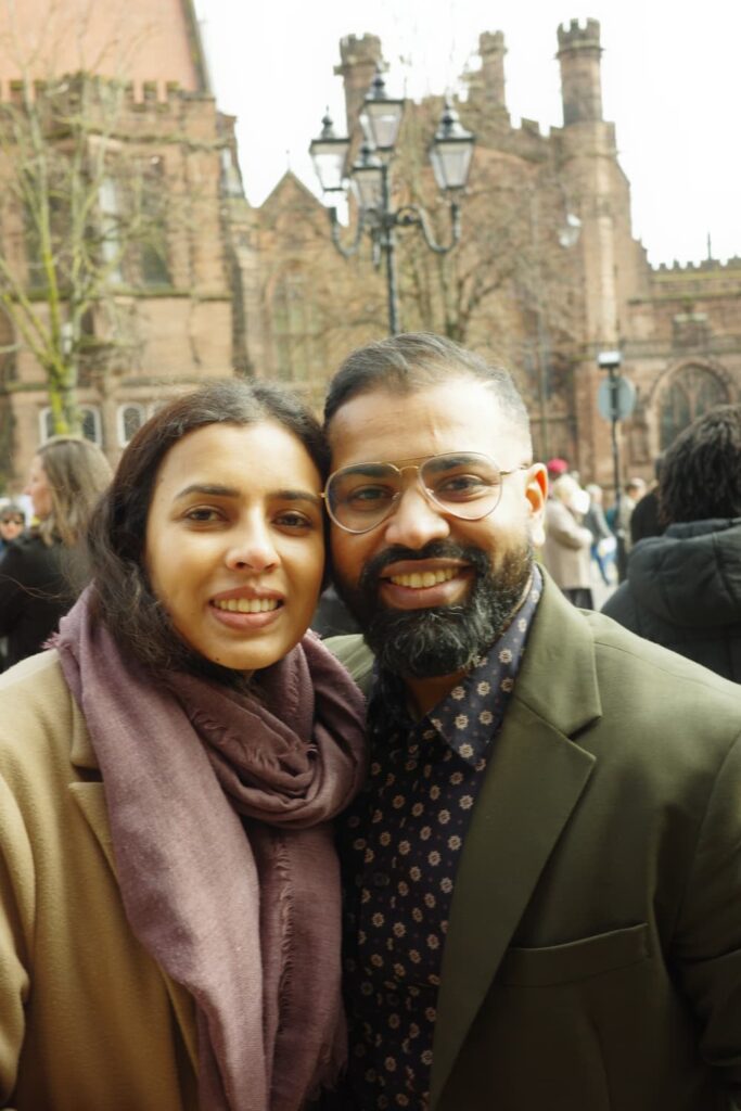Aben and Julie in front of a castle